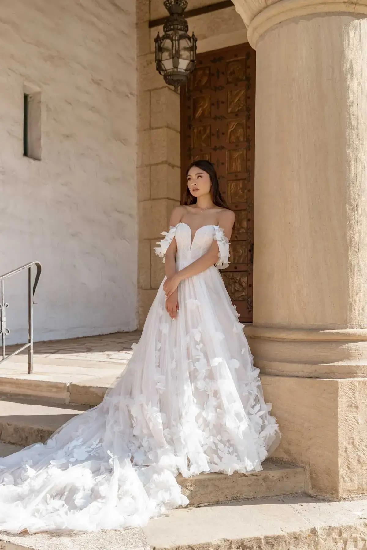 Exploring Bold Lace Wedding Gowns by Essense of Australia Image